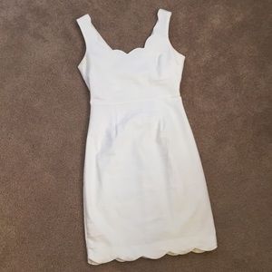 White dress with scallop trim